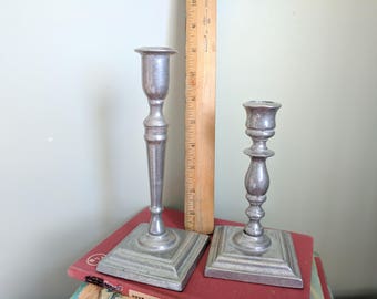 Two Silver Colored Candlesticks, 6 and 7.75 Inches Tall, Weigh 14.8 oz together