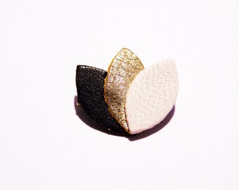 Black leather, gold and beige petals brooch