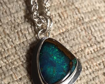 Handmade Vibrant green boulder opal pendant set in sterling silver