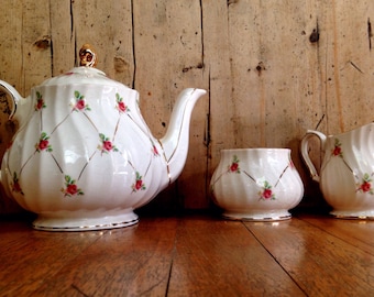 Pale pink Sadler rosebud teapot, creamer and sugar bowl set made in England, vintage tea set