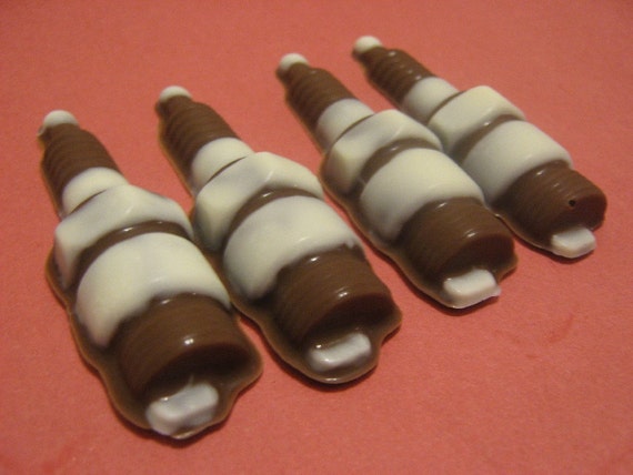 One dozen chocolate spark plug candies