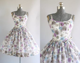 Vintage 1950s Dress / 50s Sun Dress / Purple and Blue Floral Dress w/ Original Waist Tie S