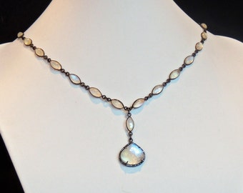 Rainbow moonstone in oxidized sterling silver with rainbow moonstone pendant set in oxidized sterling silver with diamond chips