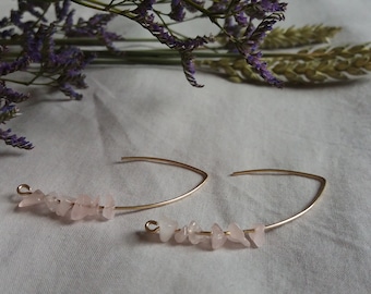 Gold bow earrings and gemstones