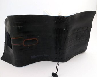 Journal, recycled bicycle inner tube, handmade blank, medium. Black velcro closure, blue felt linen .