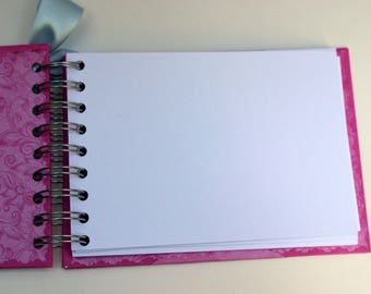 Add additional pages in multiples of 10 to your book