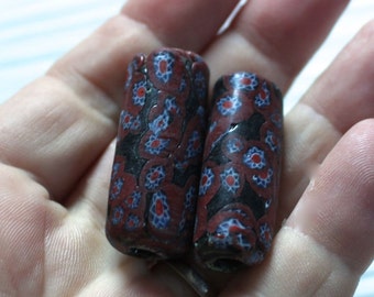 Red and black millefiori glass tubes