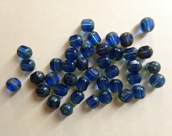 Old 7mm montana blue cathedral glass beads