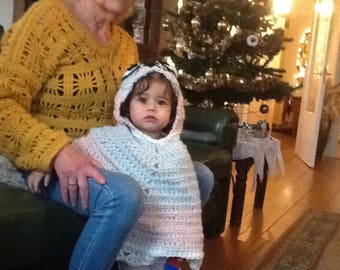 Patterned children's poncho with Poezenkop