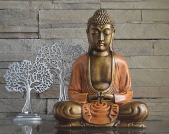 Grande sculpture de Bouddha en résine finition bronze-orange, fait à la main à Bali. Visitez notre nouvelle boutique Etsy !