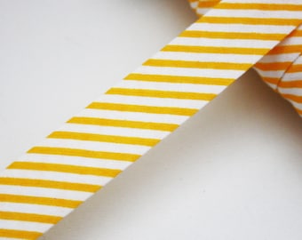 Bias striped yellow/orange and white 18 mm, folded, striped