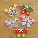 Butterfly buttons, pack of 10 wooden buttons in bright colours, great for crafts, each one 35mm x 25mm