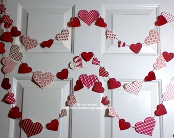 Red and White Heart Garland..9' of Hearts on Red and white Bakers Twine..Designer paper die cut...embossed die cut card stock hearts...