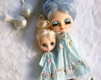 Pink or blue colors... For Middie Blythe.