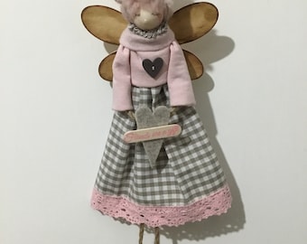Decorative doll with message.