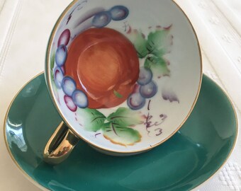 Ucagco Teacup and Saucer - Hand Painted in Japan