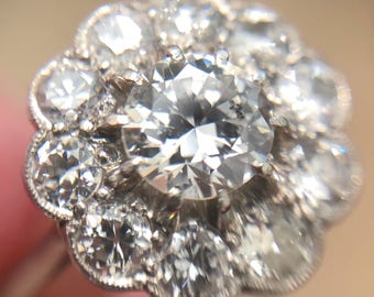 Edwardian diamond cluster engagement ring in platinum, from about 1920