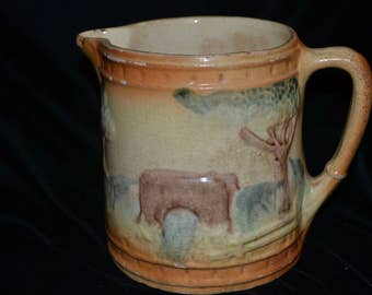 1800's Pottery Pitcher with Farm Design