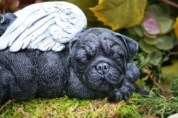 angel pug statue