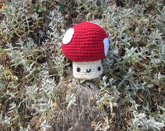 Red and white mushroom with incorporated, crochet blanket