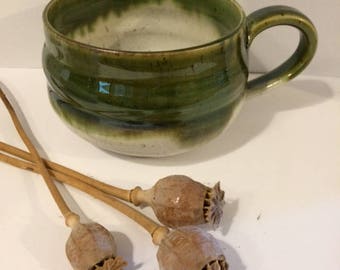 Large green stoneware mug.