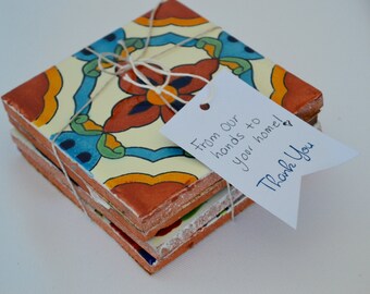 Set of 4 Mexican tiles repurposed as coasters.