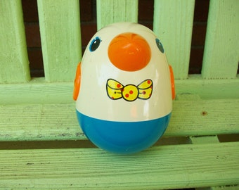 1970s Playskool Vintage Roly Poly Penguin - as the toy rolls around it there are bells -
