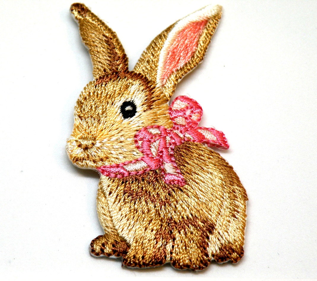 So cute bunny rabbit with a pink bow easter bunny beautiful So cute bunny rabbit with a pink bow easter bunny beautiful