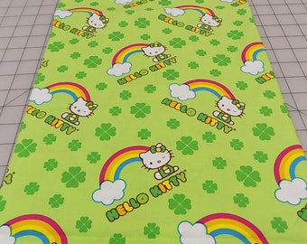 Hello Kitty Fabric, Hello Kitty St Patrick Rainbow Toss, St Patrick, Rainbow, Shamrocks, Green, Sanrio Co, Cotton, Woven, Fabric by the Yard