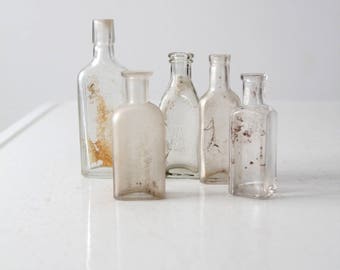 antique apothecary bottle collection, clear glass bottles 5 pc
