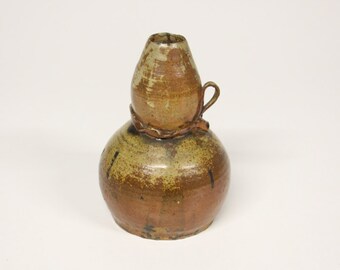 Art object of ceramics-amalgamation of 2 vases