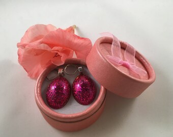 Sparkly magenta statement earrings