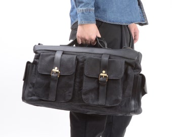 Handmade waxed canvas and leather overnight bag in black