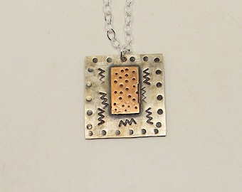 Sterling silver mixed metal jewelry necklace pendant. Steampunk jewelry pendant.