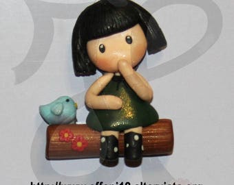Refrigerator magnets with little dolls