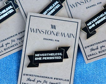 Nevertheless, She Persisted. Enamel pin- black & gold.