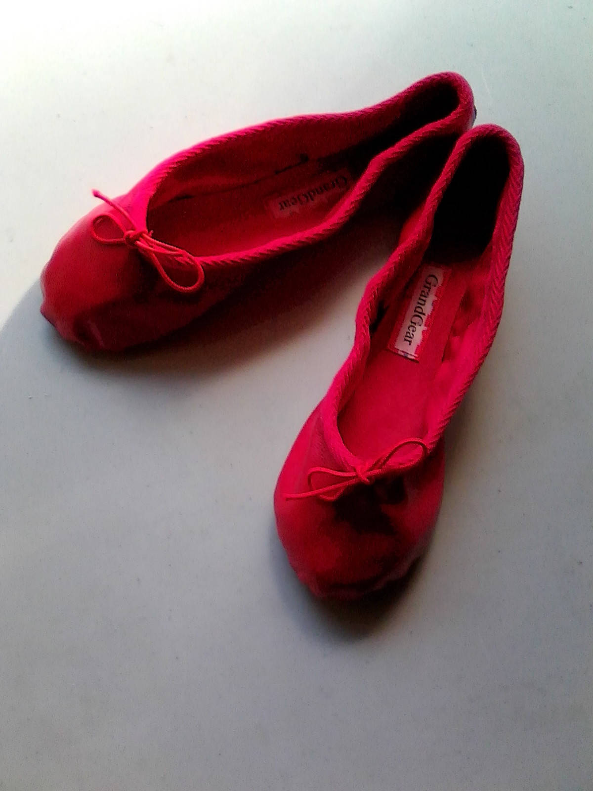 red ballet slippers with ribbons