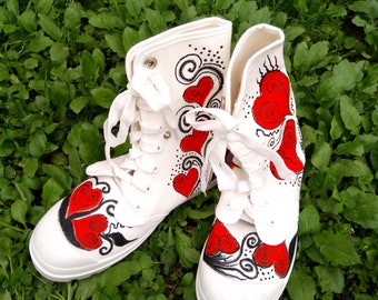 High sneakers with red hearts