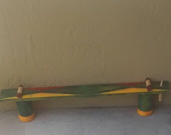 African-American one-string board zither (diddley bow)