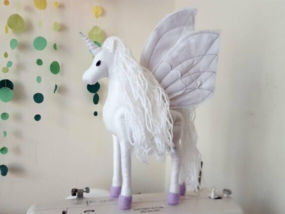 white unicorn soft toy