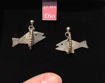 Fish through hoops earrings
