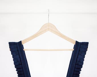 Knitted dark blue overall dress with pleats
