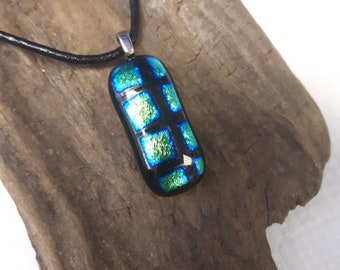 A lovely small dichroic glass pendant.