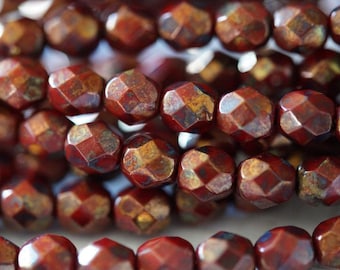 6mm Opaque Red with Bronze Picasso Finish Round Faceted Beads - Bead Soup Beads