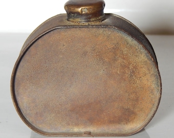 Vintage tinware oval bottle