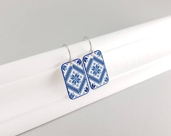 Ethnic design earrings made of shrink plastic in blue and white