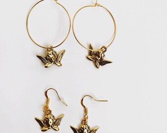 The cherub earrings in gold