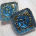 Square teal blue/ turquoise blue glass with gold buttons ~ set of 2 at 11/16th inch