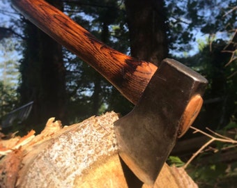Plumb hachet. Be prepared crest.