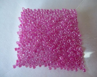 500 2.2 mm purple glass Pearl colored seed beads